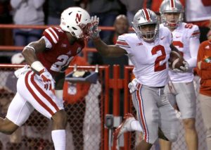 J.K. Dobbins fends off Lamar Jackson