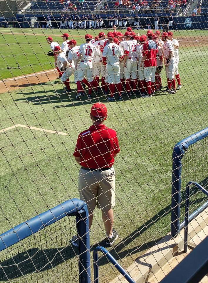 Keeping watch over the boys in red