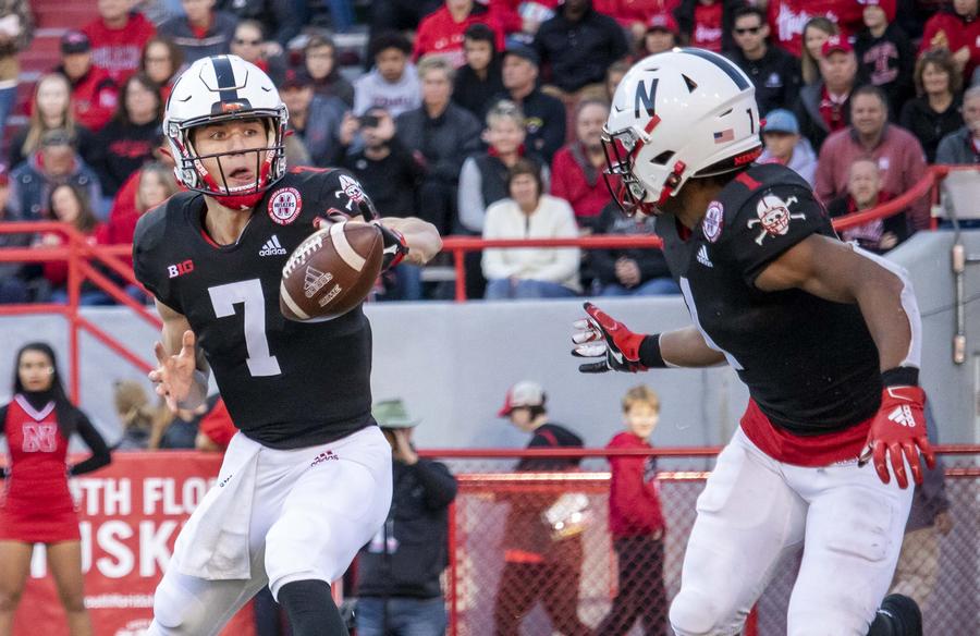 Luke McCaffrey pitches to RB Wan'Dale Robinson in the third quarter
