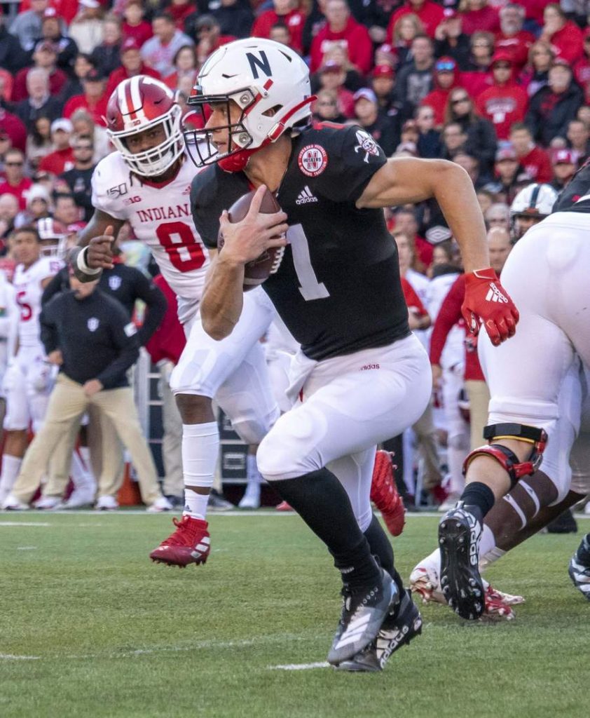 Luke McCaffrey takes off for a gain of 14 yards in the third quarter