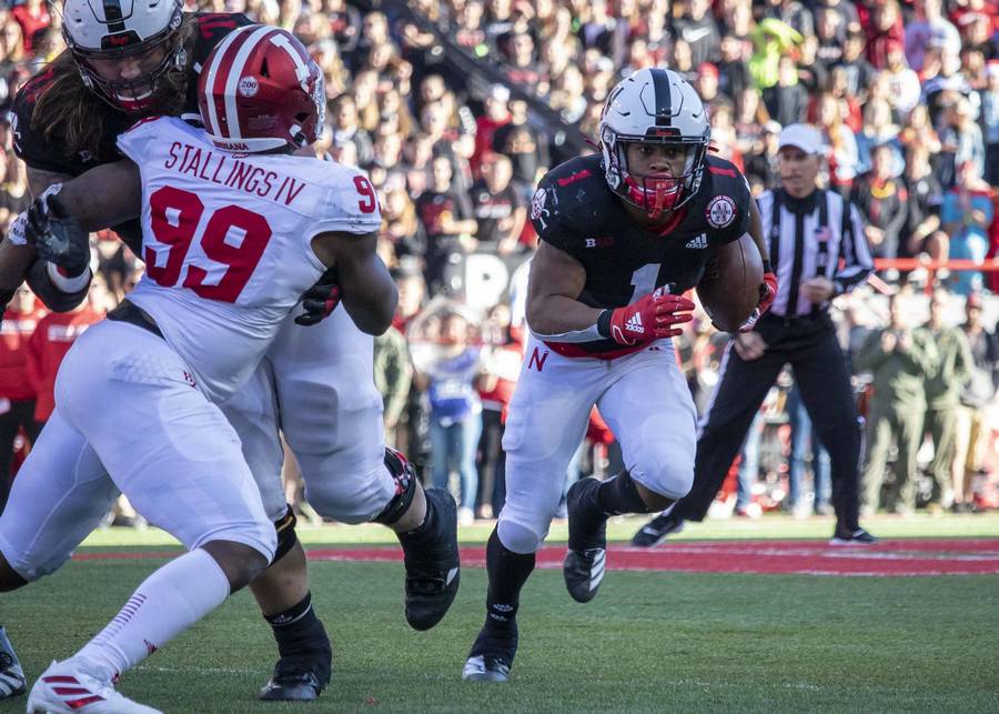 Wan'Dale Robinson gains yardage against Indiana
