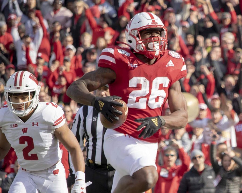 Dedrick Mills scores the game's opening points on a 12-yard run