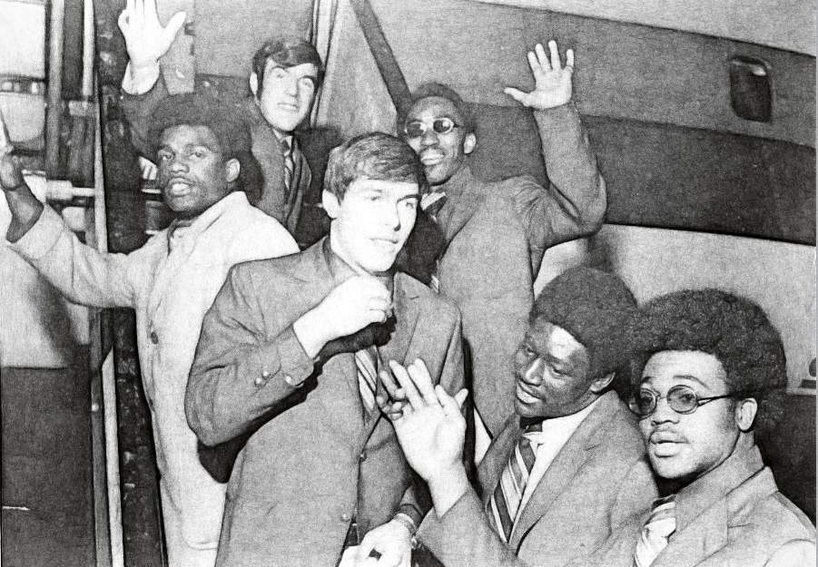 players boarding plane