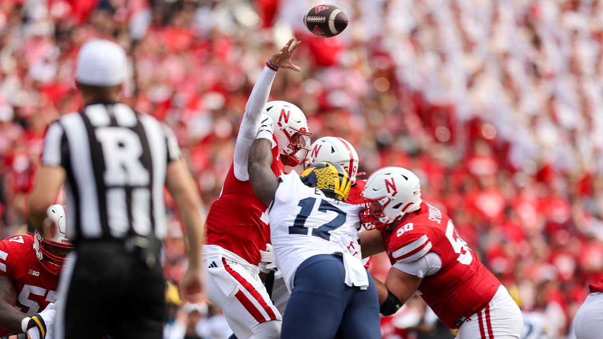 Dylan Raiola was under pressure most of the day against Michigan, including this first-quarter pass attempt.