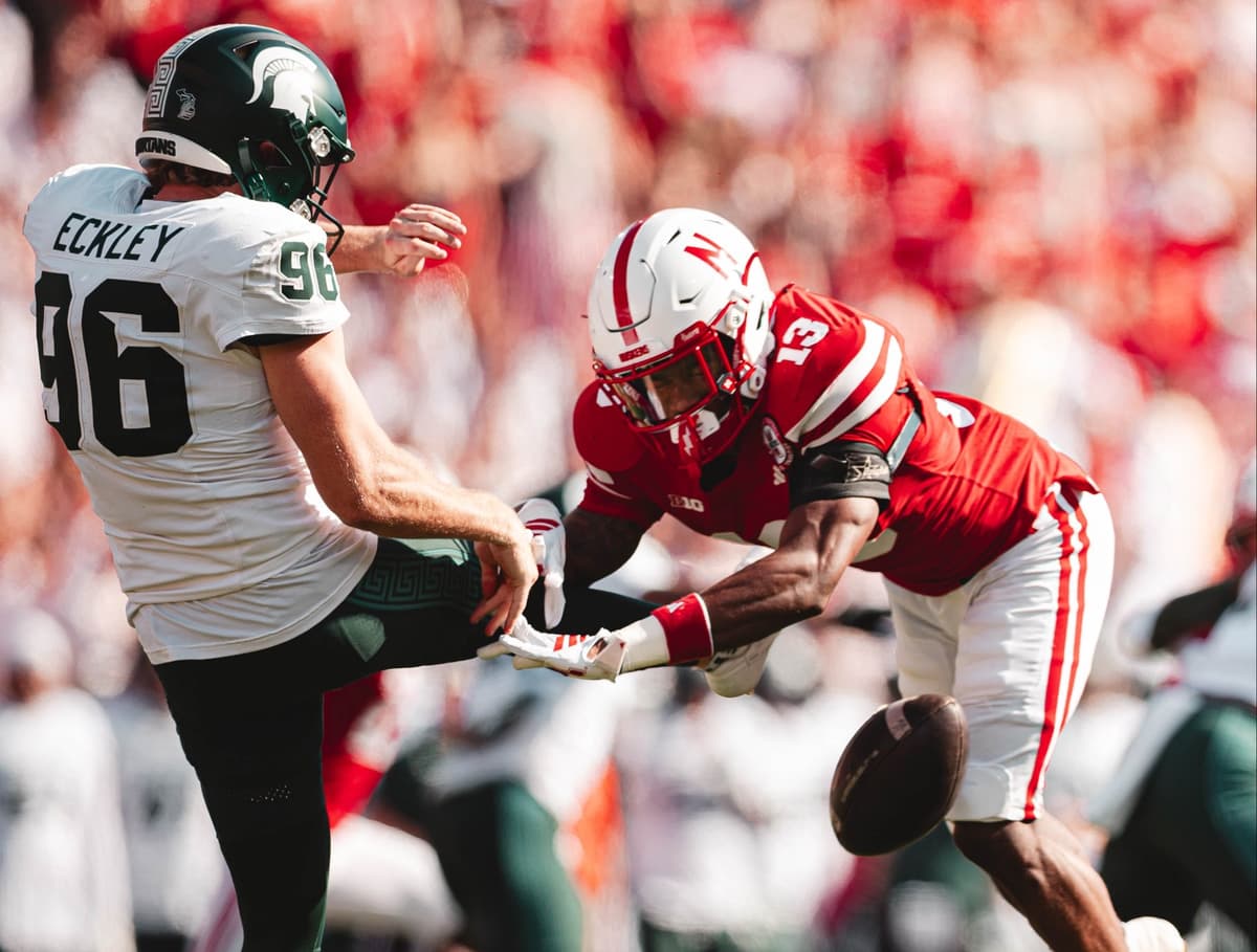 Jamir Conn blocks Michigan State's first punt. Carter Nelson took the ball into the end zone for a touchdown.
