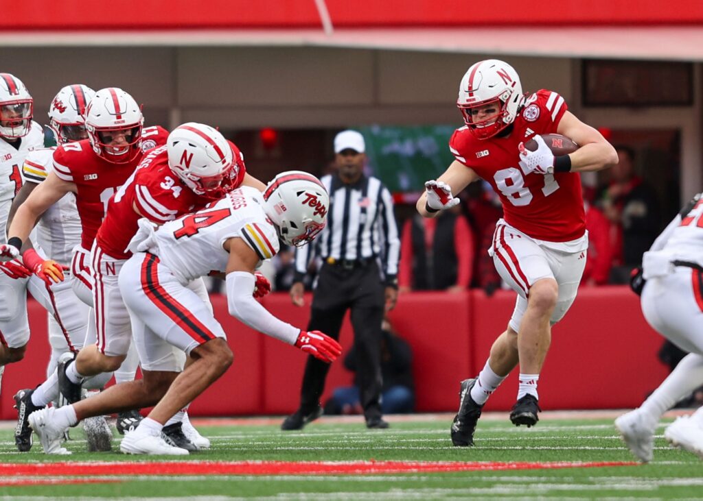 Nate Boerkircher carries against Maryland in 2023 on a fake punt